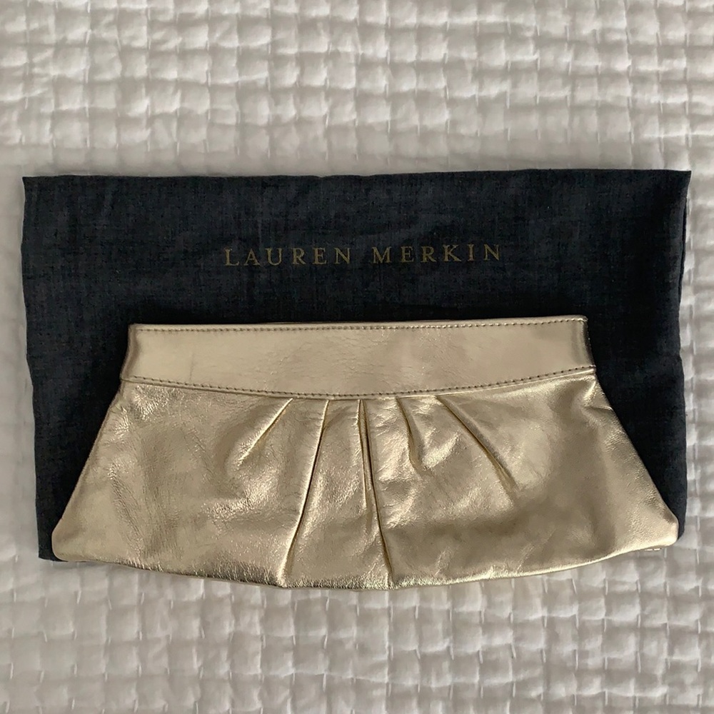 Laura Merkin gold clutch